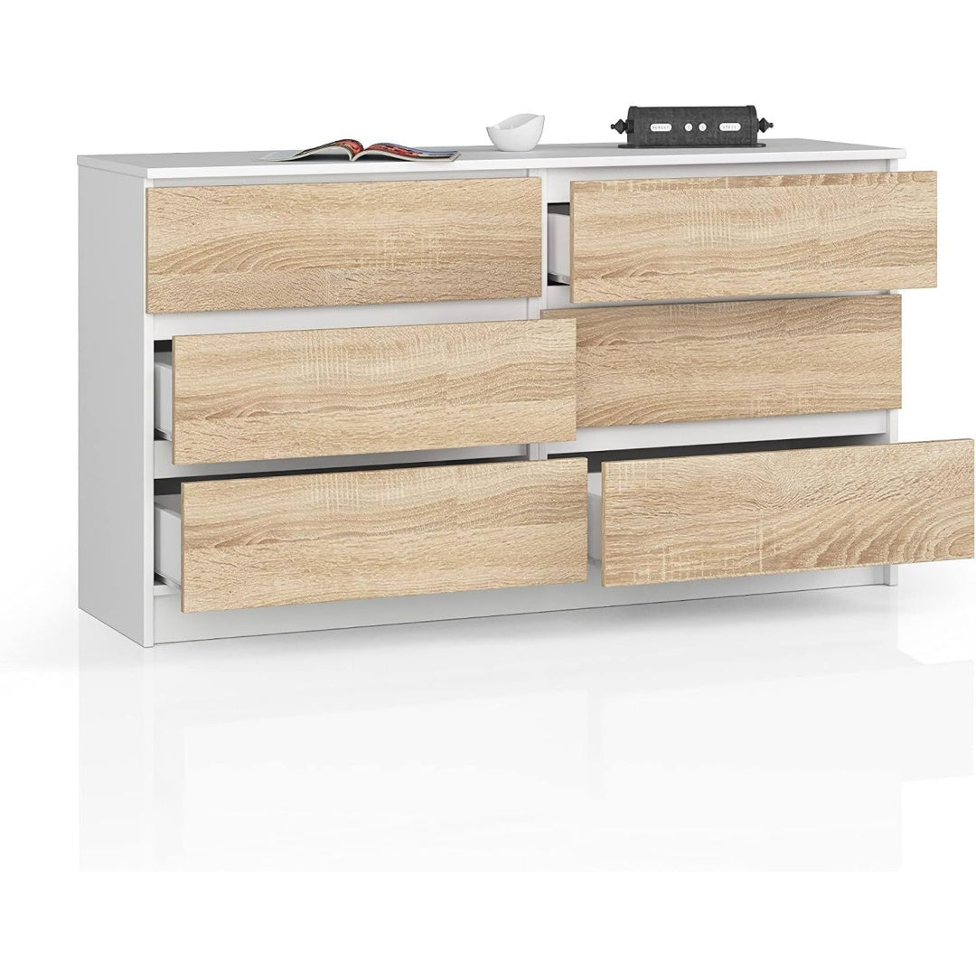 Le charme du rangement avec ce commode avec tiroirs, aux lignes contemporaines, coloris blanc et chene